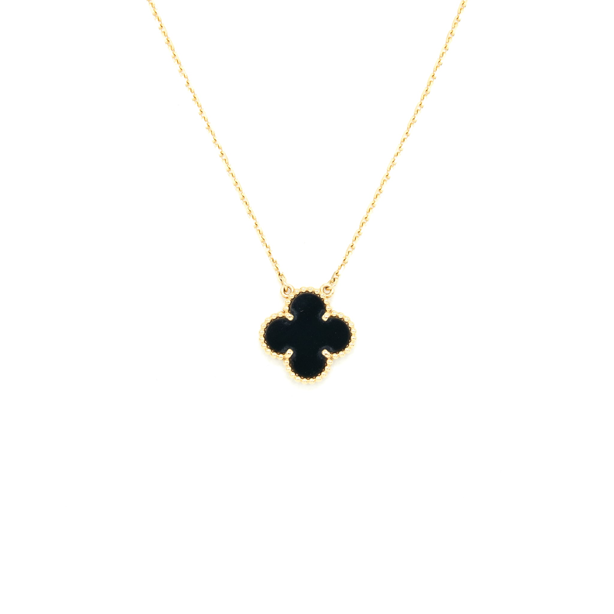 VAN CLEEF & ARPELS VINTAGE ALHAMBRA PENDANT ONYX AND YELLOW GOLD
